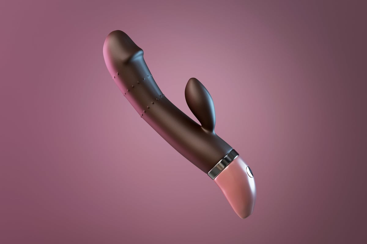 Modern rabbit vibrator on pink background