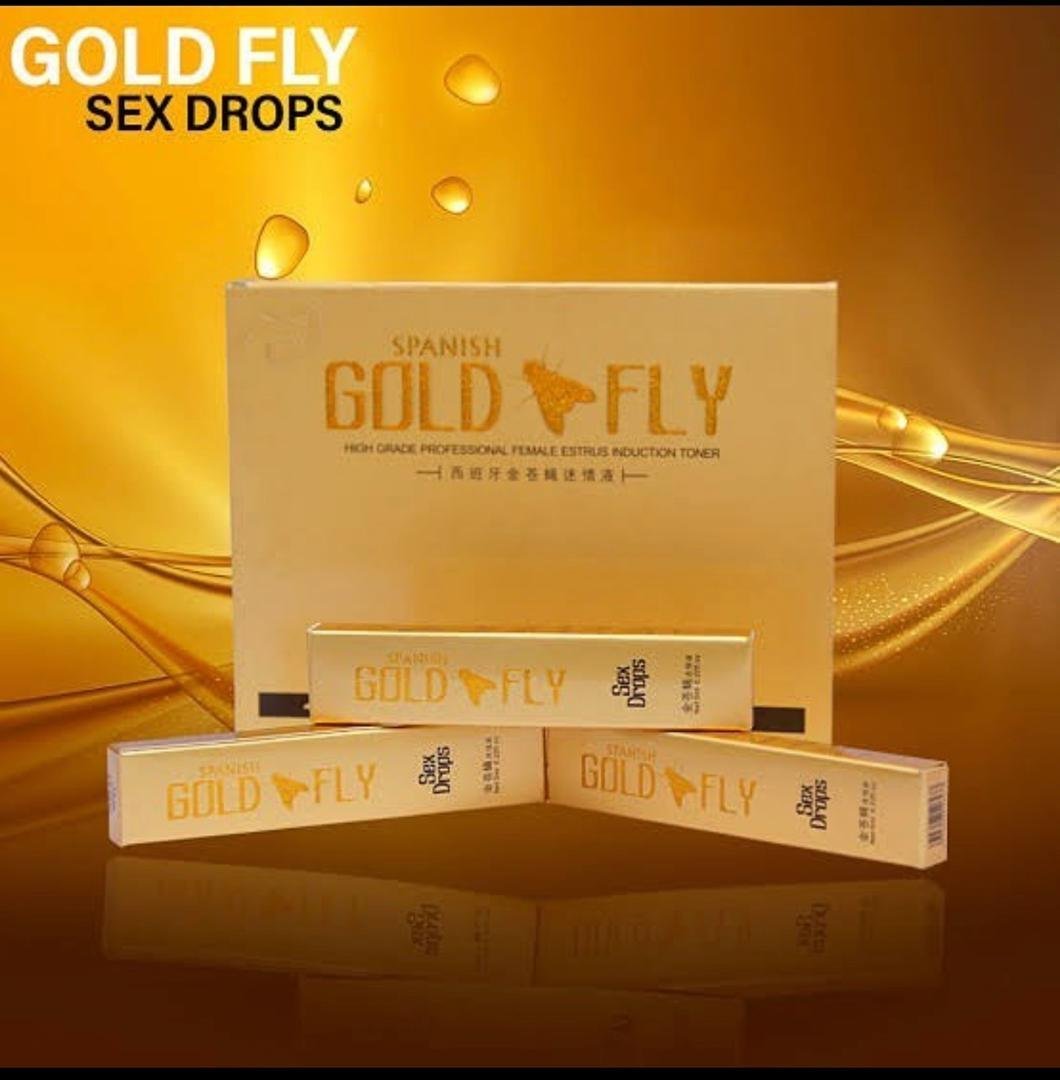 Spanish Gold Fly sex drops — individual golden sachets and shimmering gold background